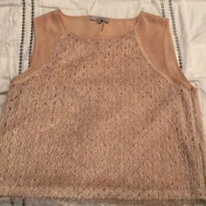 Fringe accented sleeveless blouse